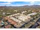 Aerial view showing complex, pool, and mountain backdrop at 37222 N Tom Darlington Dr # 2, Carefree, AZ 85377