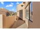 Front entrance of home with a walkway and desert plants at 37222 N Tom Darlington Dr # 2, Carefree, AZ 85377