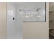 Walk-in shower with glass enclosure and white subway tile at 37222 N Tom Darlington Dr # 2, Carefree, AZ 85377