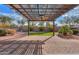 Pergola with string lights and artificial turf at 42521 W Sea Eagle Dr, Maricopa, AZ 85138