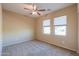 Bedroom with carpet and ceiling fan at 42521 W Sea Eagle Dr, Maricopa, AZ 85138