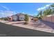 House with a landscaped yard and block wall at 42521 W Sea Eagle Dr, Maricopa, AZ 85138