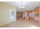 Bright kitchen with an island and tile flooring at 42521 W Sea Eagle Dr, Maricopa, AZ 85138