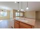 Kitchen features double sink and granite countertops at 42521 W Sea Eagle Dr, Maricopa, AZ 85138