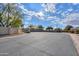 Residential street view with a yellow car parked at 42521 W Sea Eagle Dr, Maricopa, AZ 85138