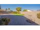 Landscaped backyard with artificial turf and gravel at 43808 W Wade Dr, Maricopa, AZ 85138