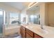 Double vanity bathroom with soaking tub and separate shower at 43808 W Wade Dr, Maricopa, AZ 85138