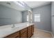 Clean bathroom with wood vanity and tiled floor at 4444 E Peach Tree Dr, Chandler, AZ 85249