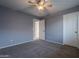 Well-lit bedroom with ceiling fan and neutral walls at 4444 E Peach Tree Dr, Chandler, AZ 85249