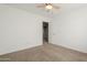 Simple bedroom with ceiling fan and neutral decor at 4444 E Peach Tree Dr, Chandler, AZ 85249