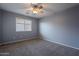 Bright bedroom featuring a ceiling fan and window blinds at 4444 E Peach Tree Dr, Chandler, AZ 85249