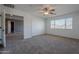 Bright bedroom with window and ceiling fan at 4444 E Peach Tree Dr, Chandler, AZ 85249