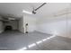 Spacious garage with overhead storage and extra space at 4444 E Peach Tree Dr, Chandler, AZ 85249