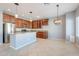 Spacious kitchen with granite countertops, stainless steel appliances, and wood cabinets at 4444 E Peach Tree Dr, Chandler, AZ 85249