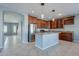 Spacious kitchen with granite countertops, stainless steel appliances, and wood cabinets at 4444 E Peach Tree Dr, Chandler, AZ 85249