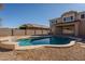 Inviting kidney shaped pool in the backyard at 4444 E Peach Tree Dr, Chandler, AZ 85249