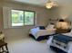 Spacious bedroom with two twin beds and window shutters at 4800 N 68Th St # 349, Scottsdale, AZ 85251