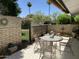 Relaxing patio with seating area, brick flooring, and a view of the backyard at 4800 N 68Th St # 349, Scottsdale, AZ 85251