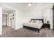 Comfortable bedroom with a plush bed and nightstand at 4808 N 24Th St # 921, Phoenix, AZ 85016