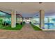 Modern building entrance with water features and landscaping at 4808 N 24Th St # 921, Phoenix, AZ 85016