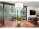 Elegant dining area with a wooden table and city views at 4808 N 24Th St # 921, Phoenix, AZ 85016