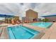 Rooftop pool and spa with lounge chairs at 4808 N 24Th St # 921, Phoenix, AZ 85016