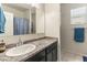 Clean bathroom with granite countertop and shower at 4916 E Rhodium Dr, San Tan Valley, AZ 85143