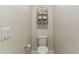 Small bathroom with toilet and floating shelves at 4916 E Rhodium Dr, San Tan Valley, AZ 85143