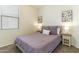 Bedroom with double bed and neutral decor at 4916 E Rhodium Dr, San Tan Valley, AZ 85143