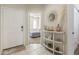 Bright entryway with a view of a bedroom and decorative console table at 4916 E Rhodium Dr, San Tan Valley, AZ 85143