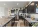 Modern kitchen with stainless steel appliances and granite countertops at 4916 E Rhodium Dr, San Tan Valley, AZ 85143