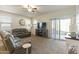 Relaxing living room with leather couches and a fireplace at 4916 E Rhodium Dr, San Tan Valley, AZ 85143