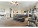 Open living room with a view of the kitchen and dining area at 4916 E Rhodium Dr, San Tan Valley, AZ 85143