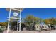 Neighborhood sign with Copper Basin name and autumnal trees at 4916 E Rhodium Dr, San Tan Valley, AZ 85143