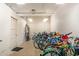 Organized bike storage room with multiple bicycles and ample space at 535 W Thomas Rd # 208, Phoenix, AZ 85013