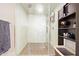 Modern shower stall with glass door and tiled walls, complemented by storage shelves for added convenience at 535 W Thomas Rd # 208, Phoenix, AZ 85013