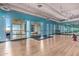 Bright yoga studio with barre, mirrors, and hardwood floors at 535 W Thomas Rd # 208, Phoenix, AZ 85013