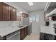 Modern kitchen with stainless steel appliances and light cabinets at 540 S West Rd # 12, Wickenburg, AZ 85390