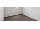 Simple bedroom with brown carpet and a window at 5515 E Rock Bush Ln, San Tan Valley, AZ 85140