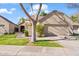 Single-story home with attached two-car garage and manicured lawn at 5534 N 15Th St, Phoenix, AZ 85014