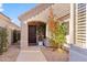 Inviting entryway with dark brown door and landscaping at 5534 N 15Th St, Phoenix, AZ 85014