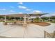 Community playground with shaded seating areas at 5704 E Butte St, Mesa, AZ 85205