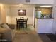 Bright dining area with adjacent kitchen and comfortable seating at 5757 W Eugie Ave # 2078, Glendale, AZ 85304