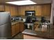 Well-equipped kitchen with stainless steel appliances at 5757 W Eugie Ave # 2078, Glendale, AZ 85304