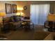 Bright living room with sectional sofa and patio access at 5757 W Eugie Ave # 2078, Glendale, AZ 85304