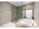 Spa-like bathroom with a soaking tub and walk-in shower at 5818 N 45Th St, Phoenix, AZ 85018