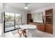 Breakfast nook with a round white table and built in cabinetry at 5818 N 45Th St, Phoenix, AZ 85018