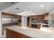 Modern kitchen with wood cabinets and light countertops at 5818 N 45Th St, Phoenix, AZ 85018