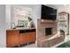 Modern wet bar with wine storage and fireplace at 5818 N 45Th St, Phoenix, AZ 85018