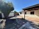 Backyard features a covered patio, storage shed, and a landscaped area at 6131 N 36Th Dr, Phoenix, AZ 85019